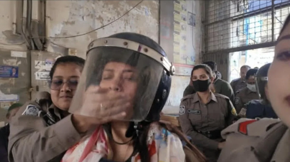 Police Cover Mouth of Former MP Tuhin as She Attempts to Speak